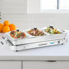 Electric warming tray with three 8 qt stainless steel serving trays, designed for maintaining food warmth efficiently.