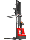 fully extended red semi-electric straddle stacker facing the back at a fourty-five degree angle