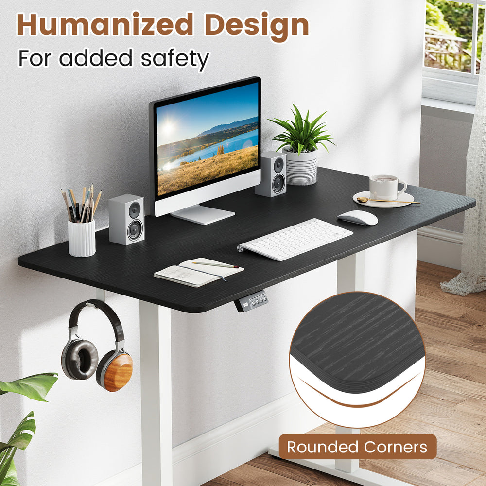 Electric standing desk with a spacious 48" x 24" black tabletop, featuring rounded corners for safety and durability.