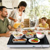 Electric warming tray with adjustable temperature, featuring a tempered glass top, ideal for keeping food warm at.