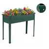 Elevated green metal raised garden bed with legs, featuring drainage holes, ideal for growing flowers and herbs.