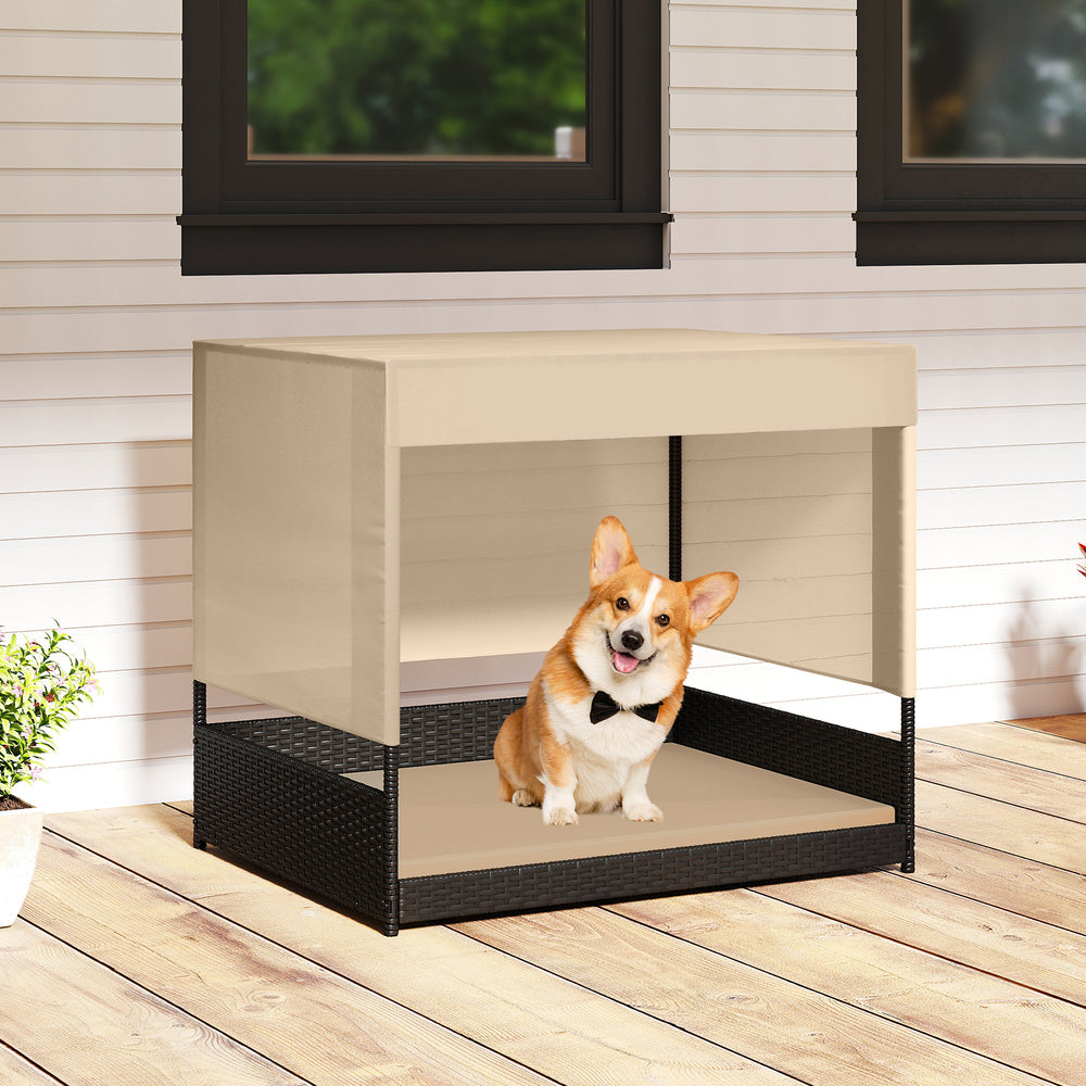 Elevated wicker dog house for small to medium breeds with removable cushion, suitable for indoor and outdoor use.