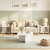 White 2-tier end table with rounded corners and storage shelves, perfect for small spaces in living rooms or bedrooms.