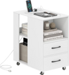 End table on wheels in white with built-in charging station, two drawers, and open shelves for versatile storage.