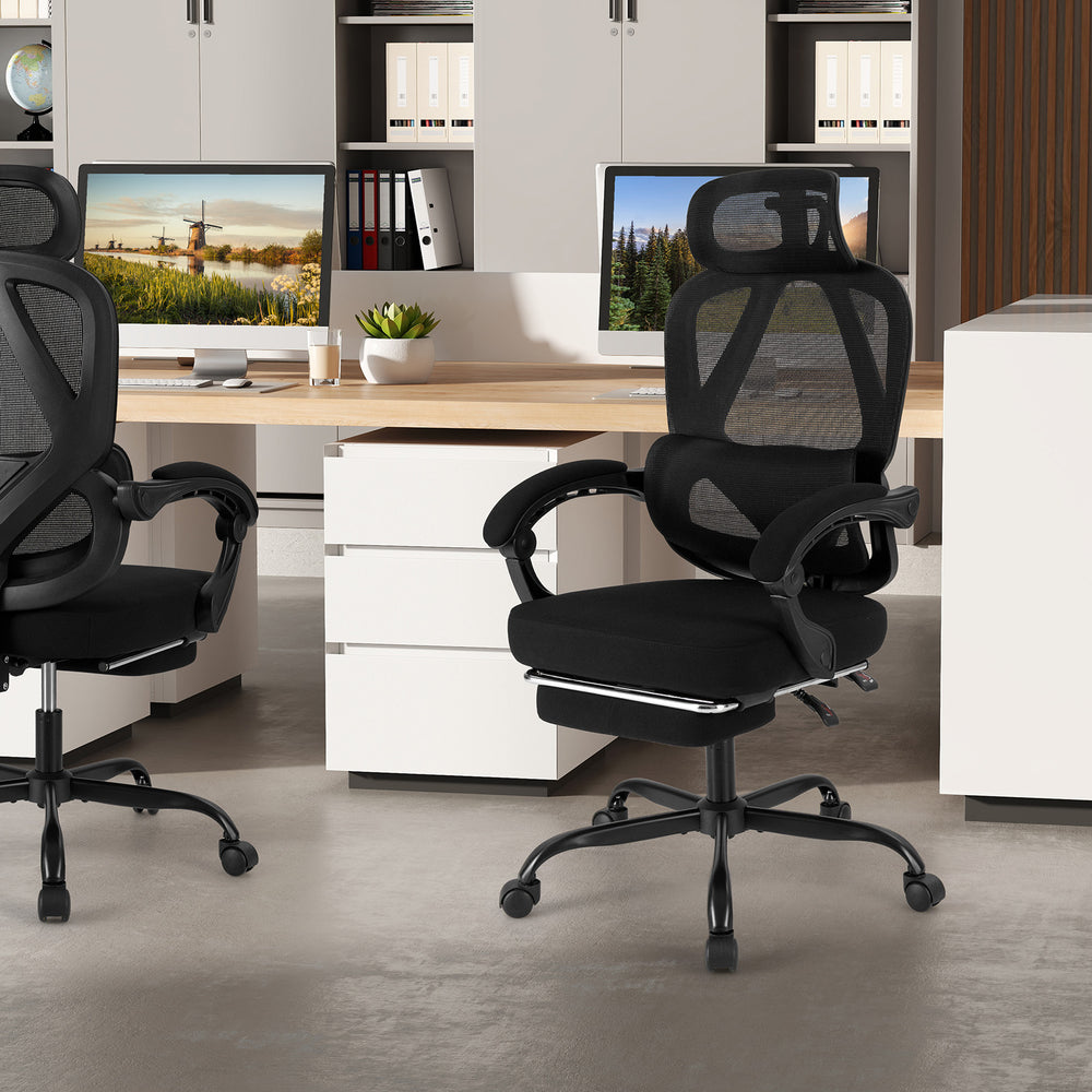 High back ergonomic office chair in black with mesh fabric, adjustable headrest, and retractable footrest for comfort.