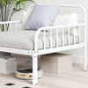 White extendable metal daybed with guardrails and armrests, ideal for relaxation and extra sleeping space.