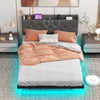 Floating full/queen size bed frame with LED lights, storage headboard, and charging station for a modern bedroom setup.