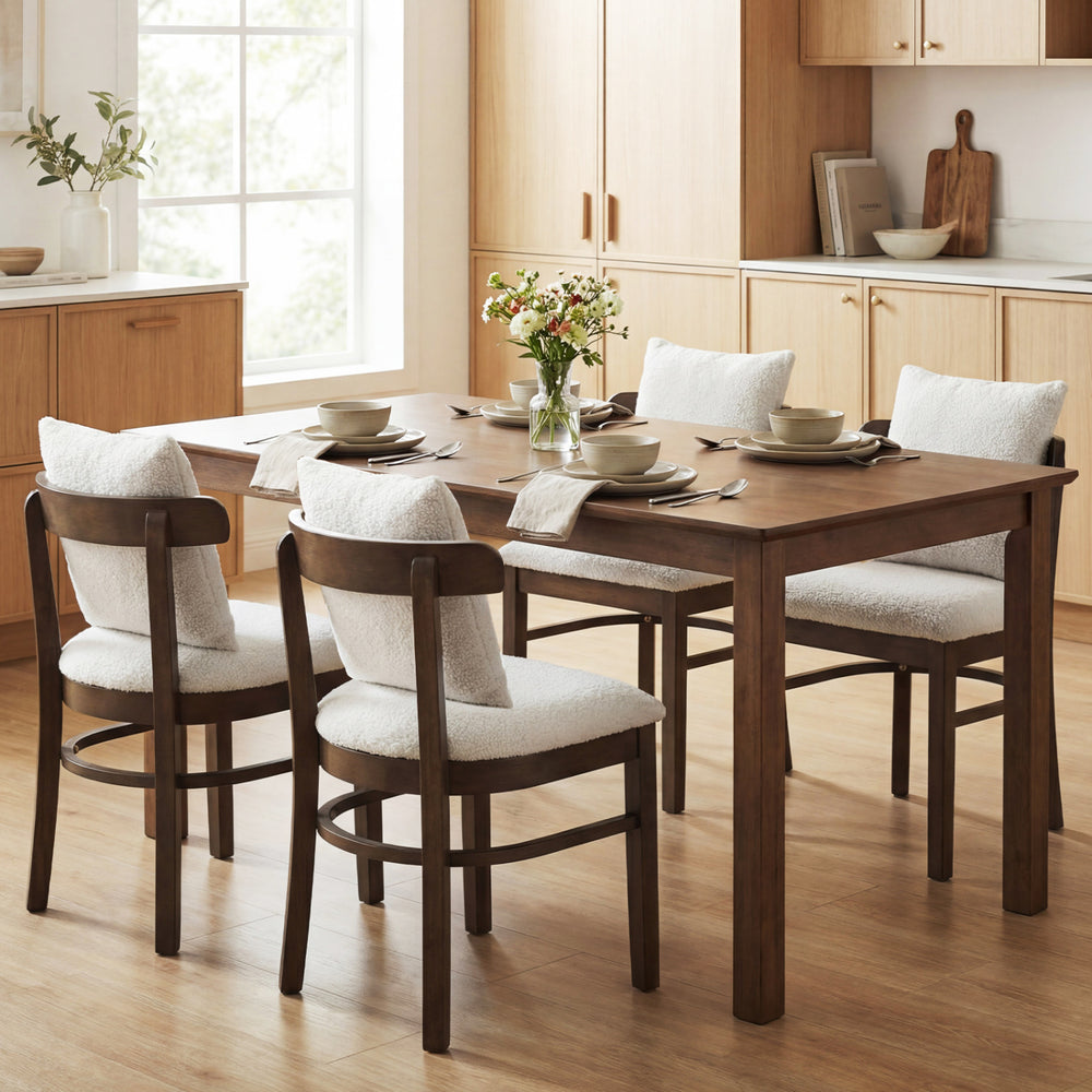 Set of 4 gray fabric upholstered dining chairs with removable pillows, featuring solid rubber wood legs for durability.