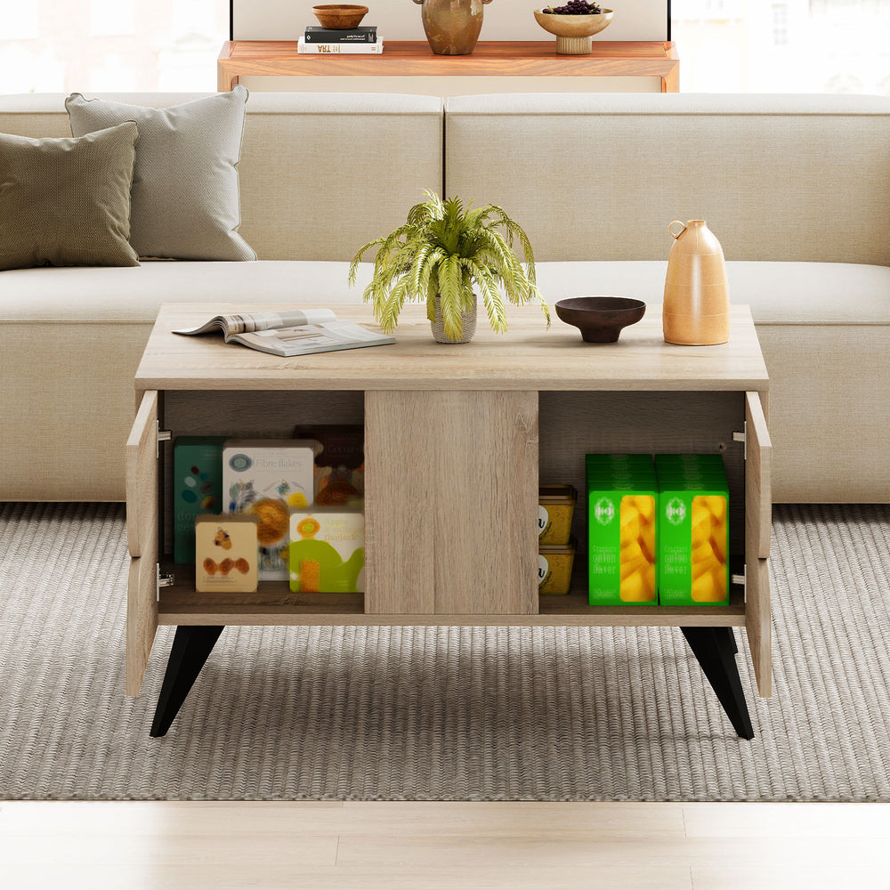 Natural wooden coffee table with storage, featuring three cabinet doors and a wide tabletop for versatile use in living.