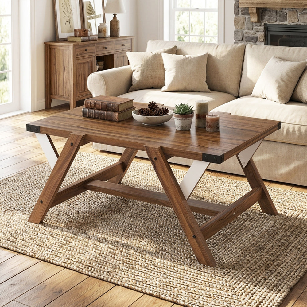Farmhouse center table with walnut finish, featuring a spacious tabletop and decorative nailhead accents for living.