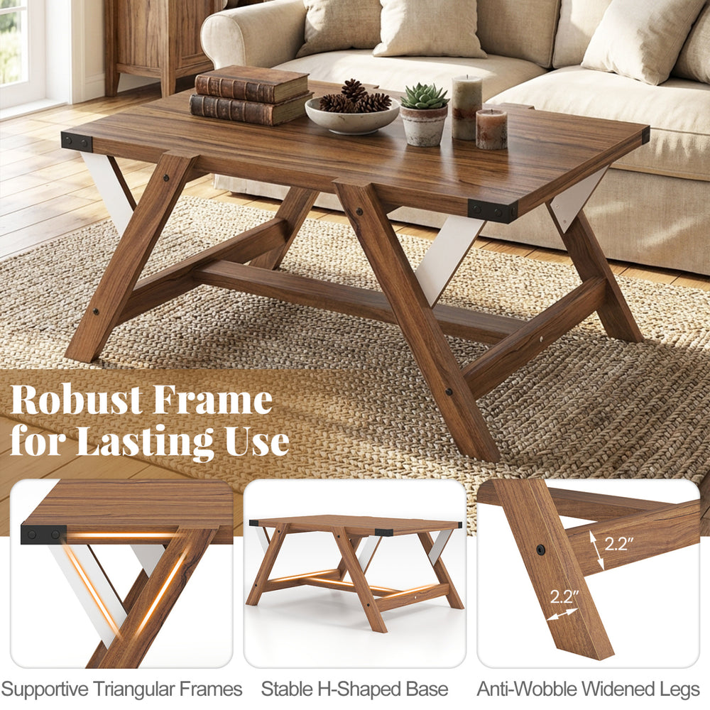Farmhouse center table in walnut with spacious tabletop, anti-wobble legs, and decorative nailhead accents for living.