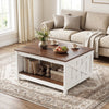 Farmhouse coffee table with a thickened wood top, white base, and open storage shelf for books and decor.
