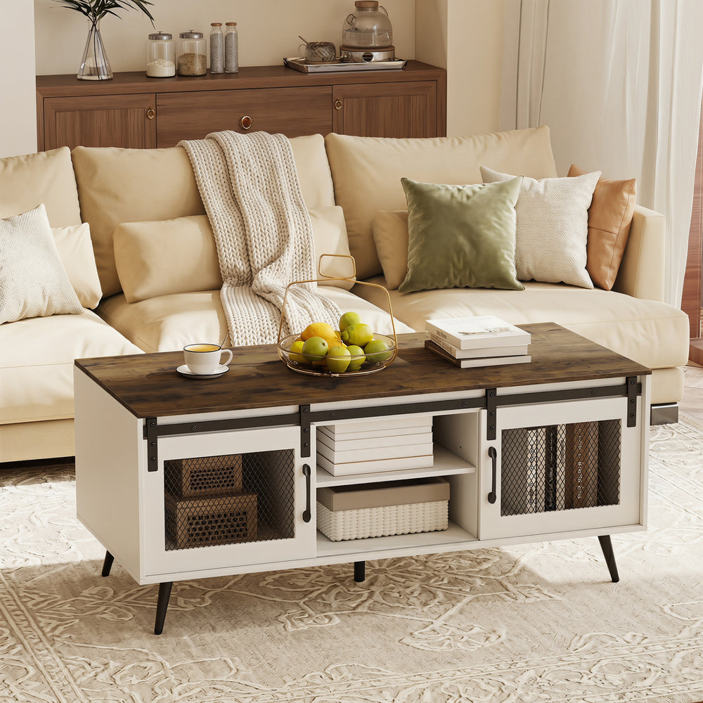 Farmhouse coffee table with sliding doors, rustic brown finish, adjustable shelf, and spacious storage for living room.