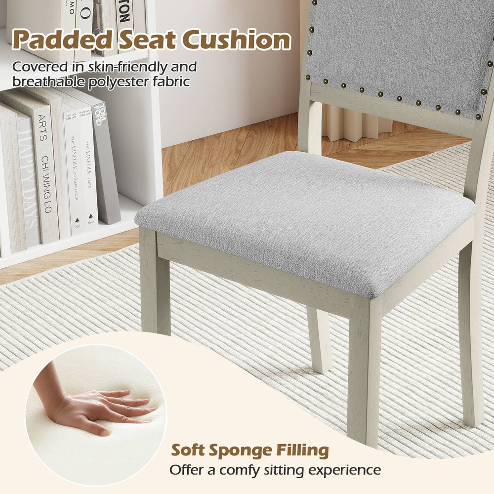 Padded seat cushion of a grey farmhouse dining chair, featuring soft sponge filling for comfort and breathable.