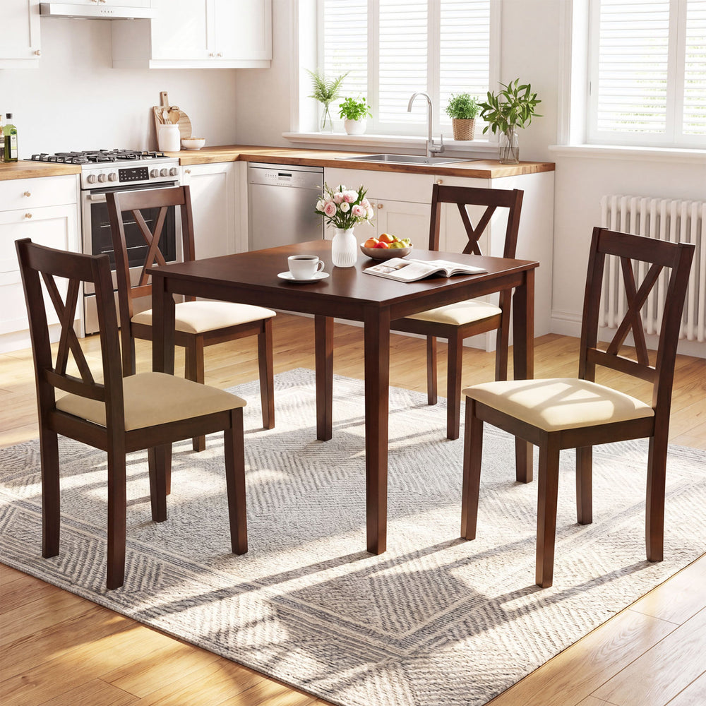 Square walnut farmhouse dining table for 4 people with cross-back chairs, perfect for kitchen dining.