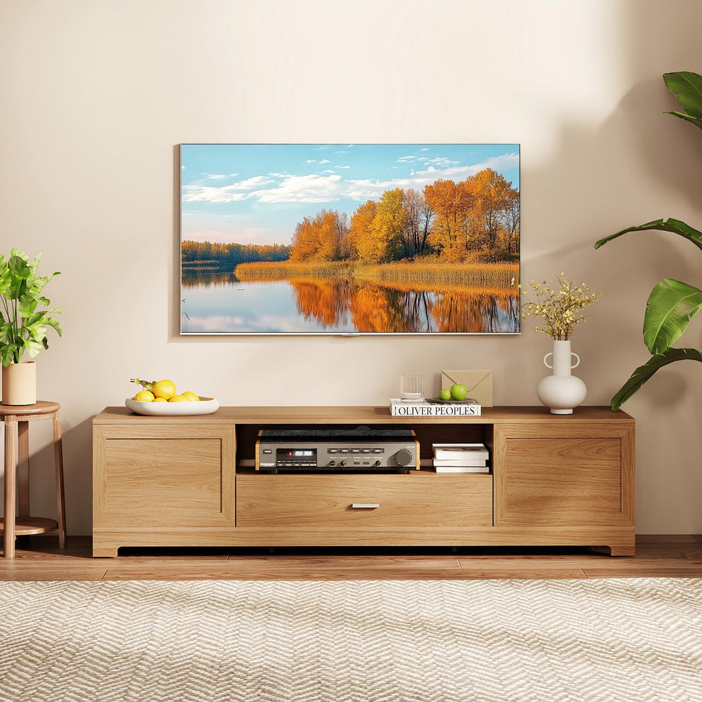 Farmhouse rustic TV stand in natural wood, accommodating TVs up to 80", featuring cabinets and organized storage.