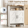 Farmhouse shoe cabinet in white features 2 barn doors, adjustable shelves, and anti-toppling devices for entryway stability.