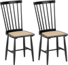 Set of 2 black farmhouse dining chairs with ergonomic curved backrests and PE rattan seats, perfect for dining rooms.