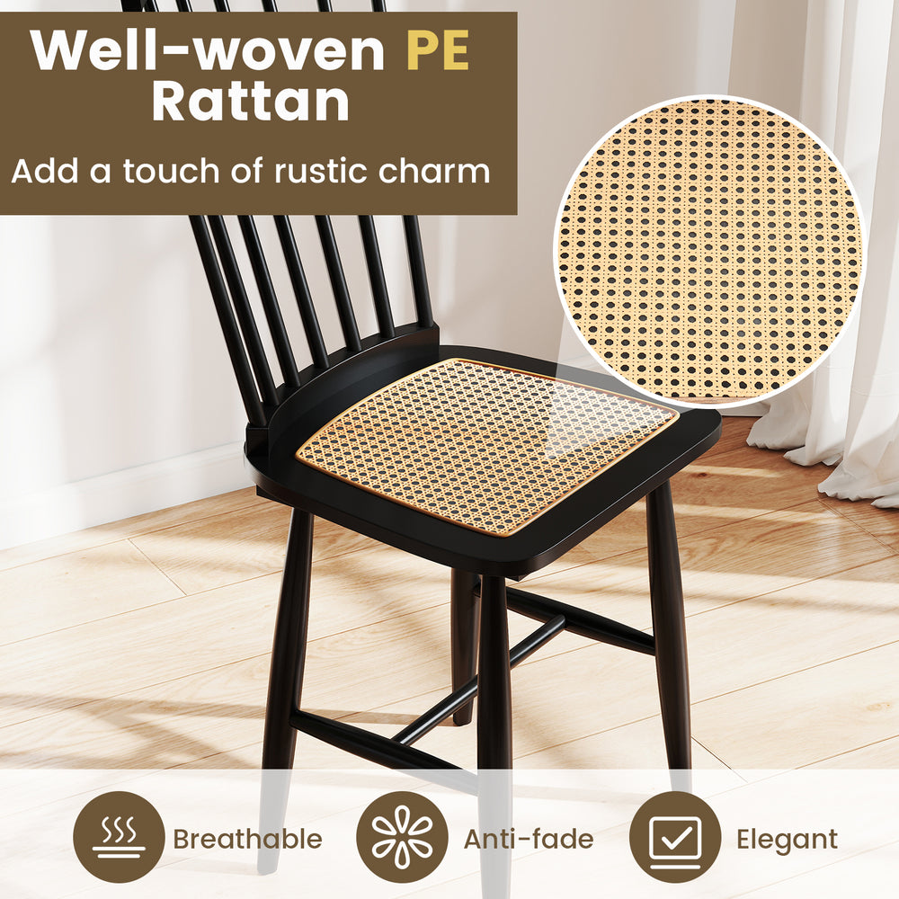 Well-woven PE rattan seat on a black rubber wood dining chair, combining comfort and vintage charm for dining spaces.