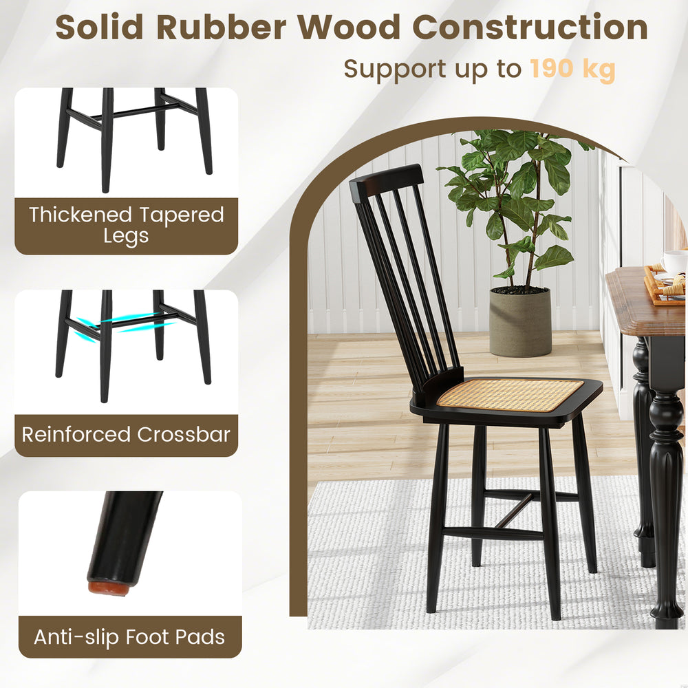 Black farmhouse dining chair with PE rattan seat, solid rubber wood construction, ergonomic backrest, ideal for dining.