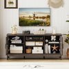 Farmhouse TV stand in gray with adjustable shelves and rustic barn doors, designed for TVs up to 65 inches.