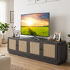 Farmhouse TV stand in black with elegant PE rattan doors, featuring a wide tabletop suitable for TVs up to 75 inches.