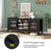 Farmhouse TV stand in black with adjustable shelves, 2 extra support legs, and glass door cabinets for elegant storage.