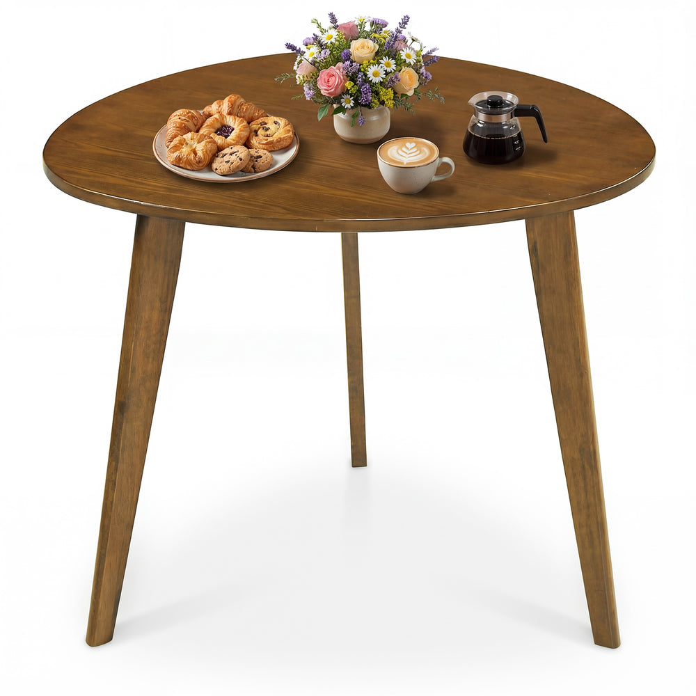 Round walnut dining table for 4 with rubber wood legs, perfect for cozy gatherings in dining rooms or cafes.
