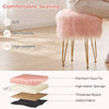 Pink faux fur vanity stool chair with metal legs, featuring a sturdy frame and compact design for bedroom or living.