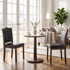 Two walnut wooden farmhouse dining chairs with faux leather upholstery, featuring comfortable padding for dining spaces.