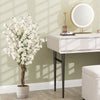Faux plum blossom plant with dense white fabric flowers and solid wood trunk, enhancing elegance in any office or.