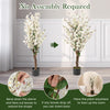 Faux plum blossom plant with white fabric flowers and solid wood trunk, perfect for adding elegance to any room.