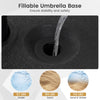Fillable umbrella base in black, designed for stability with water or sand, featuring a large drainage spout and dual.