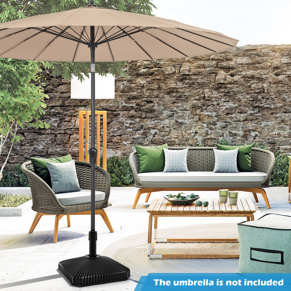 Fillable umbrella base in black with shell texture, designed for 6-10 ft patio umbrellas, showcasing stability and.