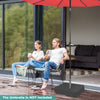 Square umbrella base with two sandbags and dust-proof cover, providing stable support for outdoor umbrellas up to 15ft.