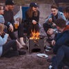 Collapsible 19-inch portable fire pit with storage bag, ideal for camping and bonfires, featuring air circulation holes.