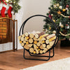 Curved 20-inch firewood log hoop in black metal, neatly storing logs for indoor or outdoor use by the fireplace.