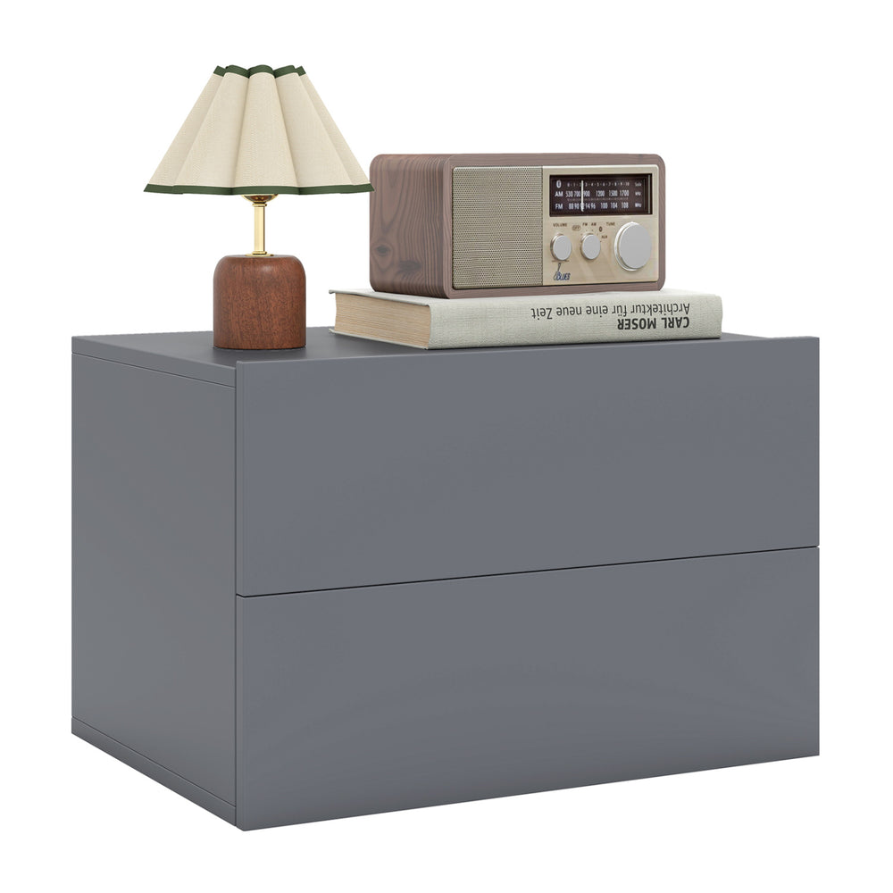 Gray floating nightstand with two storage drawers, ideal for bedroom organization and space-saving design.