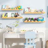 Set of 4 natural fir wood wall-mounted picture ledge shelves with toys and books, ideal for kids' rooms and playrooms.