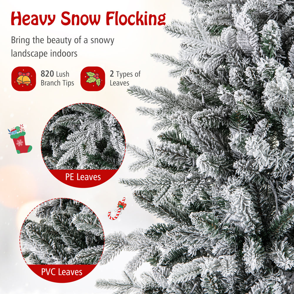 Close-up of the flocked branches of a 6-foot Christmas tree with PE and PVC leaves, ideal for festive indoor decor.