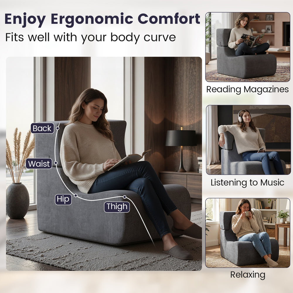 Curved gray floor chair with detachable headrest, designed for ergonomic comfort while reading or relaxing.