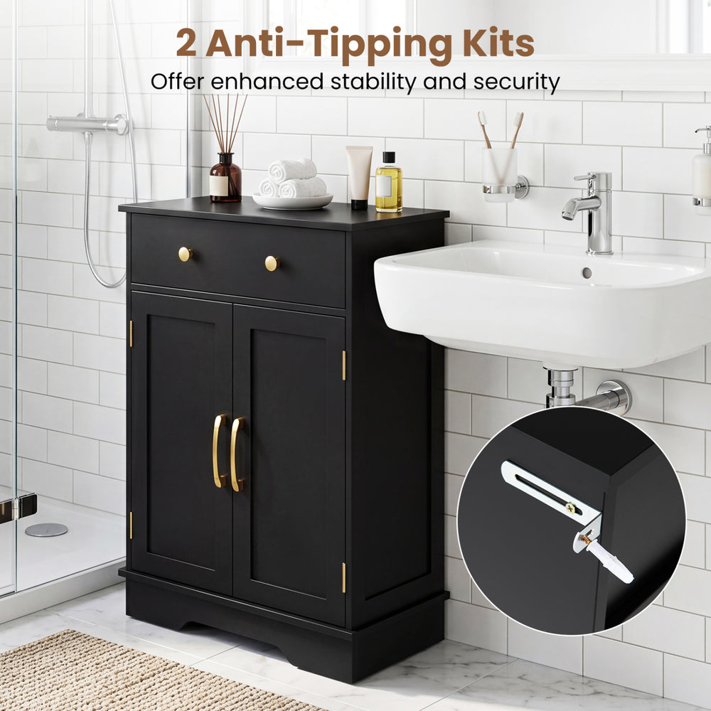 Black floor storage cabinet with doors, drawer, and adjustable shelf, featuring anti-tipping kits for enhanced stability.