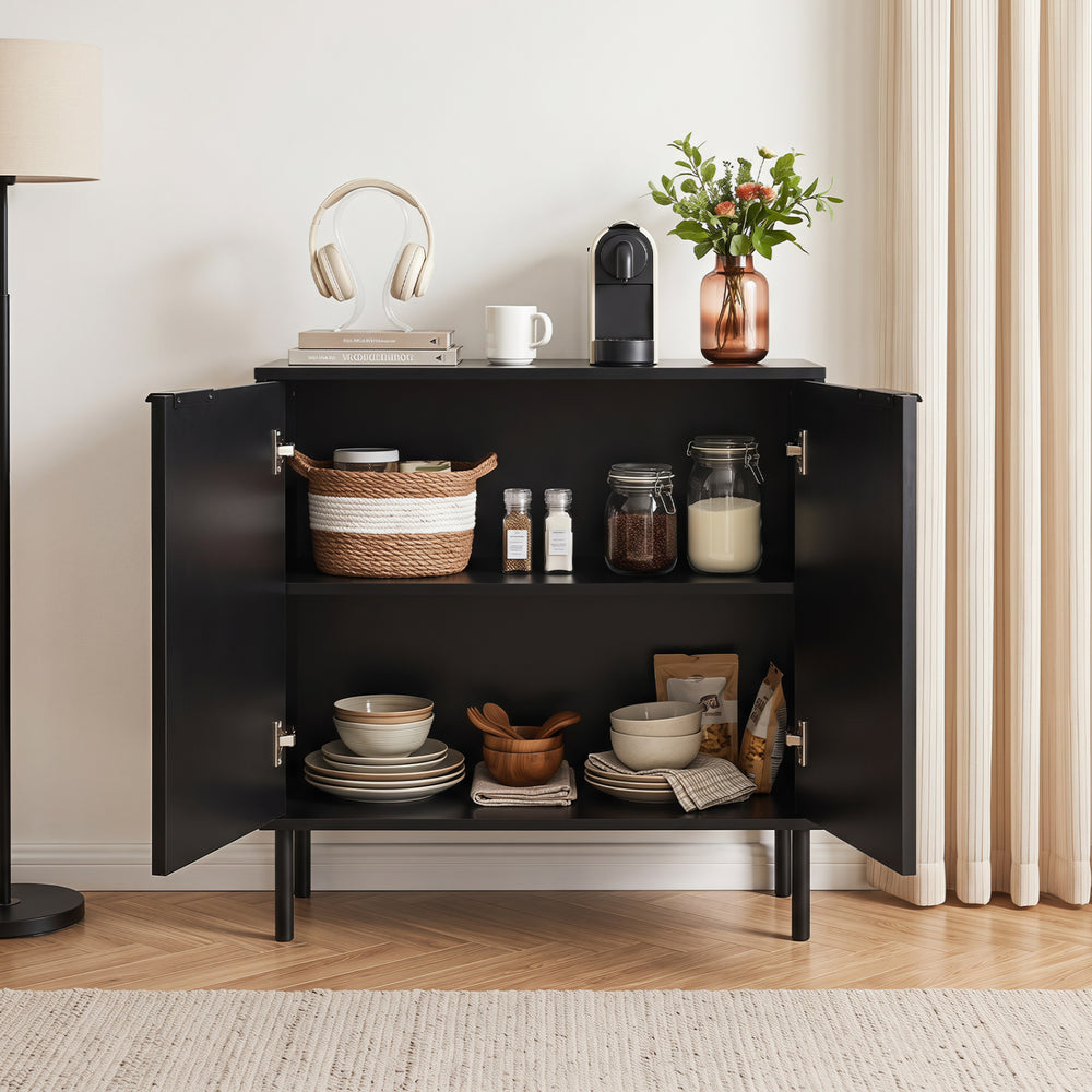 Fluted buffet cabinet in black features a spacious tabletop and two-door storage for kitchenware and dining essentials.