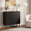 Fluted black buffet cabinet with two doors, spacious tabletop, and metal legs for versatile use in kitchen or dining room.