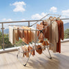 Foldable 2-tier clothes drying rack made of aluminum and stainless steel, ideal for outdoor balcony drying.