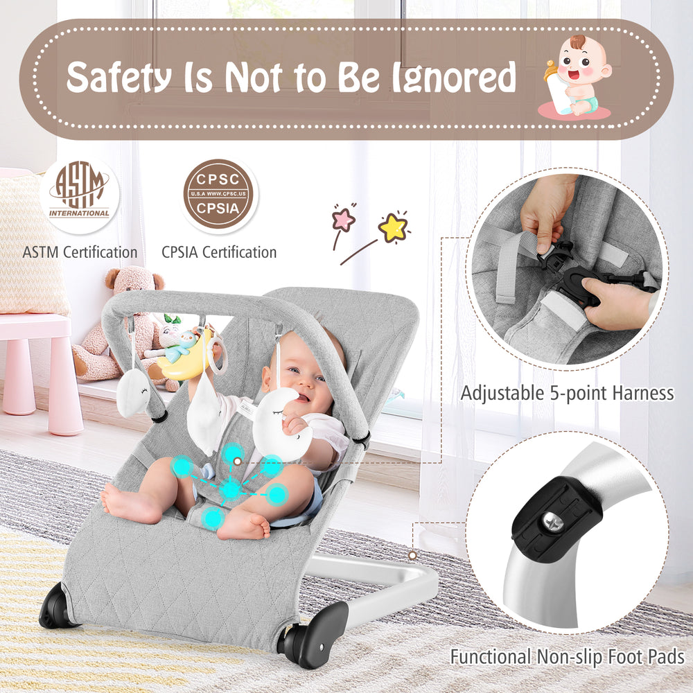 Foldable baby bouncer in gray with removable cover, adjustable 5-point harness, and anti-slip foot pads for safety.