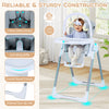 Foldable baby high chair in light gray with adjustable height, safety harness, and removable toy bar for secure seating.