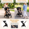 Foldable baby stroller in black features a reversible handle for parent-facing or forward-facing use, ideal for various terrains.