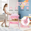 Pink foldable diaper changing table on wheels shown beside a parent, with bathtub and storage shelf for babies and infants.