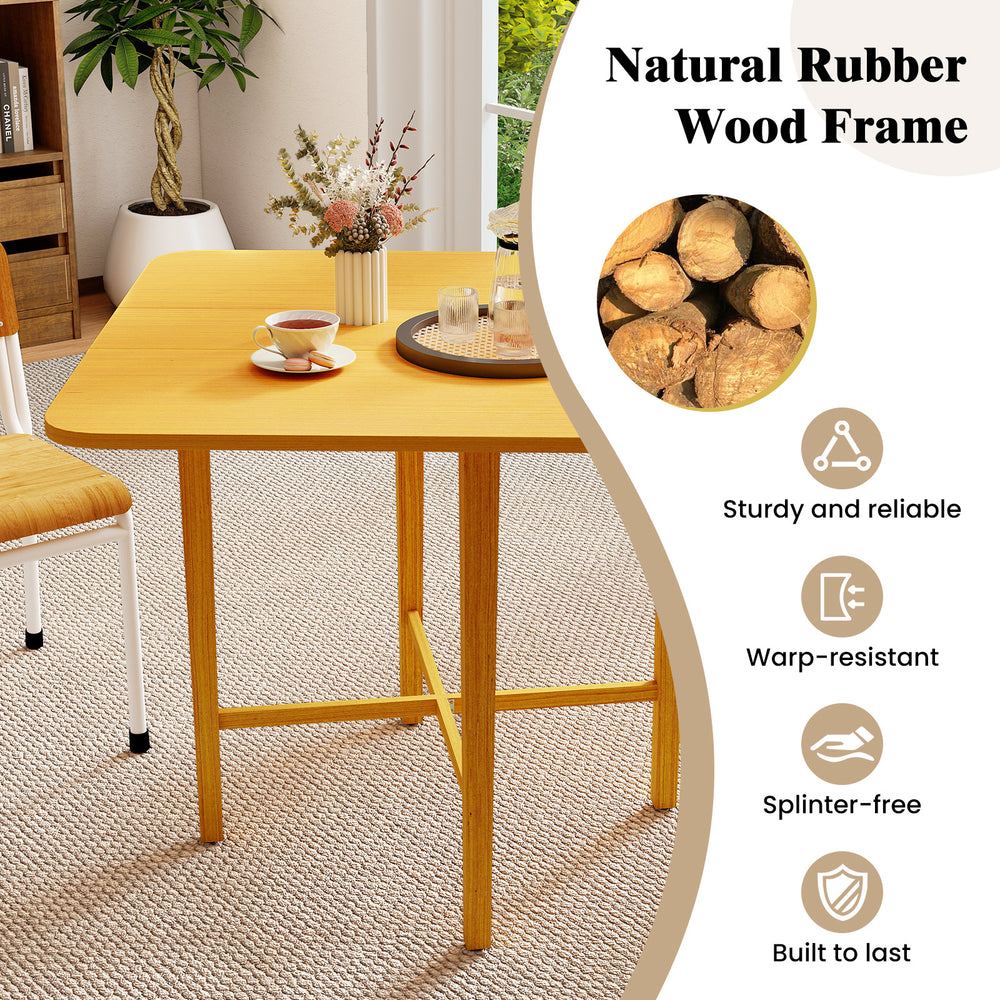 Foldable dining table for 2-4 people with natural rubber wood legs, featuring a sturdy design and rustic wood grain.